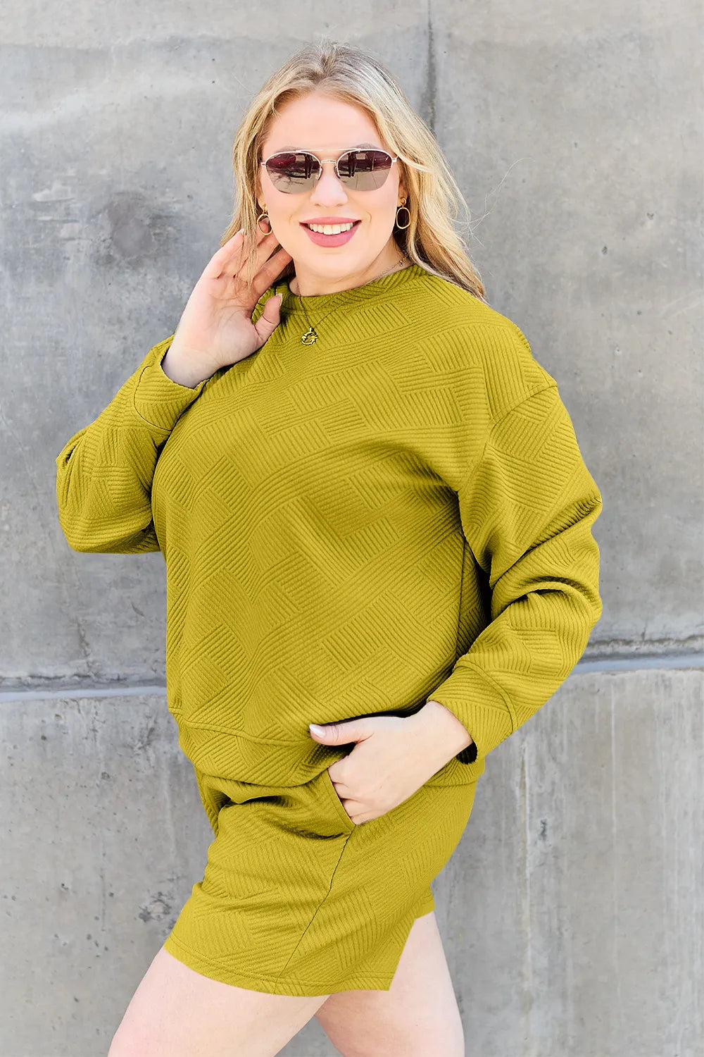 Trendsi Double Take full-size textured long sleeve top with matching drawstring shorts set in chestnut color, casual and comfortable.