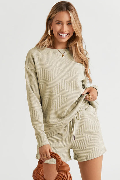 Trendsi Double Take chestnut long sleeve textured top and drawstring shorts set, casual loungewear outfit, front view.