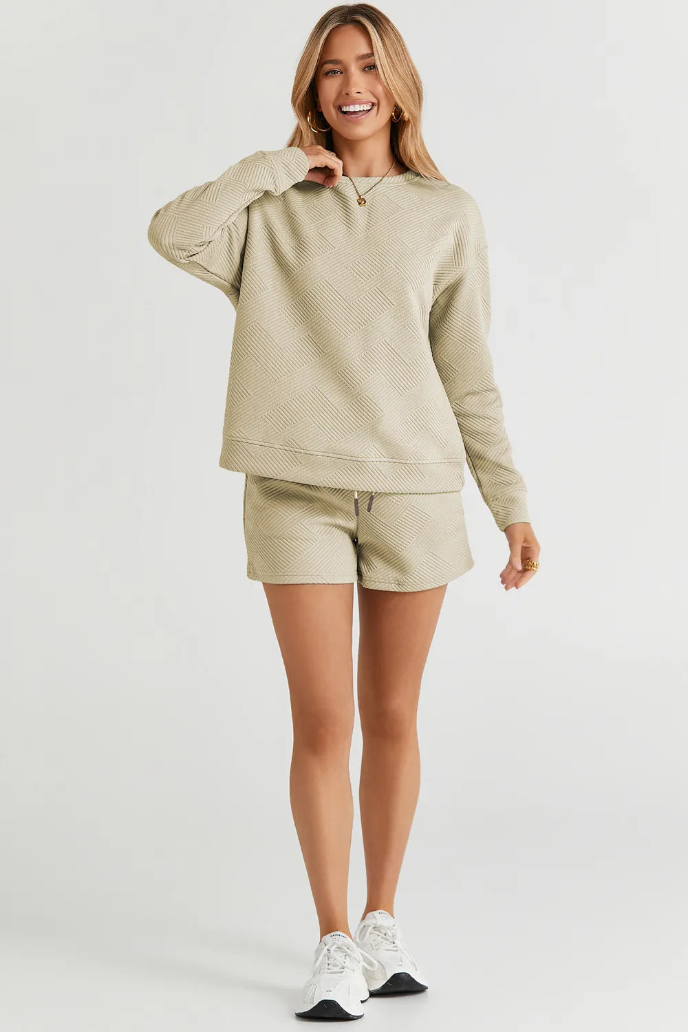 Trendsi chestnut-colored double take full-size textured long sleeve top with matching drawstring shorts set, casual and stylish.