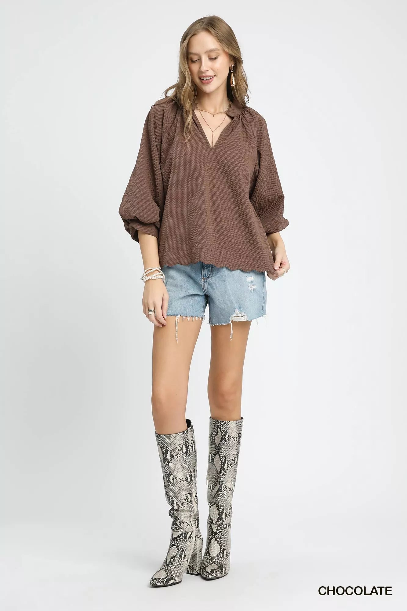 Plus size Umgee textured notched balloon sleeve blouse in chocolate color, featuring full-size fit and stylish design.
