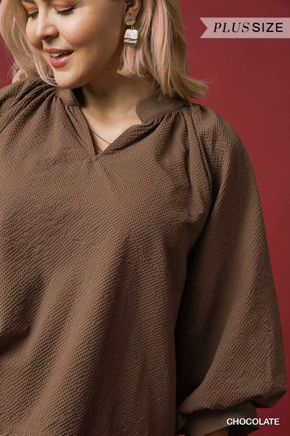 Full size textured chocolate balloon sleeve blouse with notched details by Umgee, featuring stylish plus size fit and textured fabric.