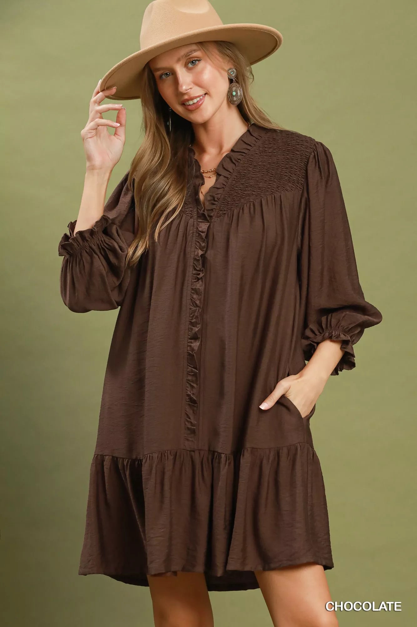 Chocolate brown Umgee smocked ruffle detail tiered mini dress with a flowy silhouette and tiered ruffle accents.