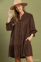 Chocolate brown Umgee smocked ruffle detail tiered mini dress with a flowy silhouette and tiered ruffle accents.