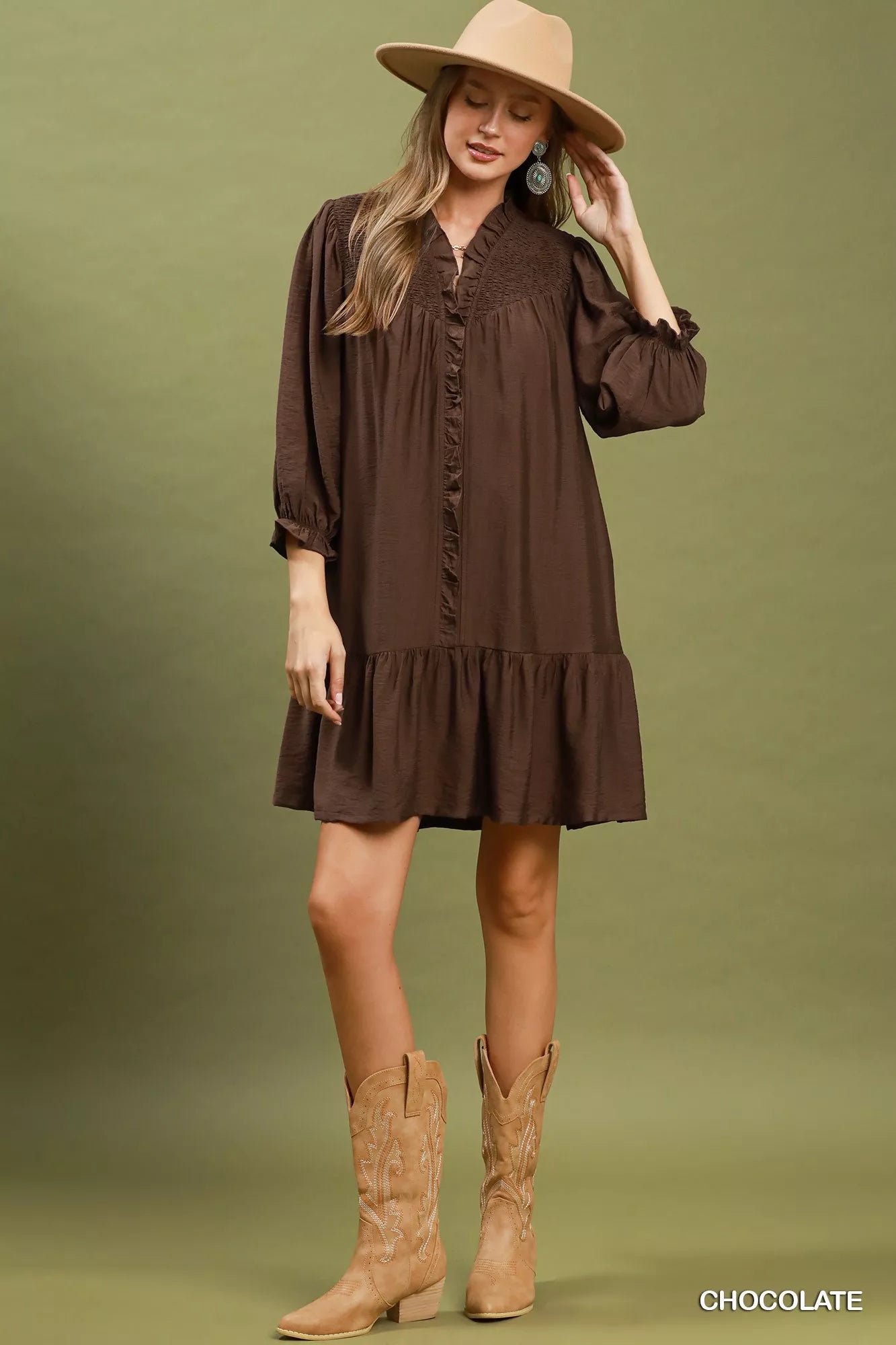 Chocolate Umgee smocked ruffle detail tiered mini dress, featuring a feminine design with ruffles and tiered layers.