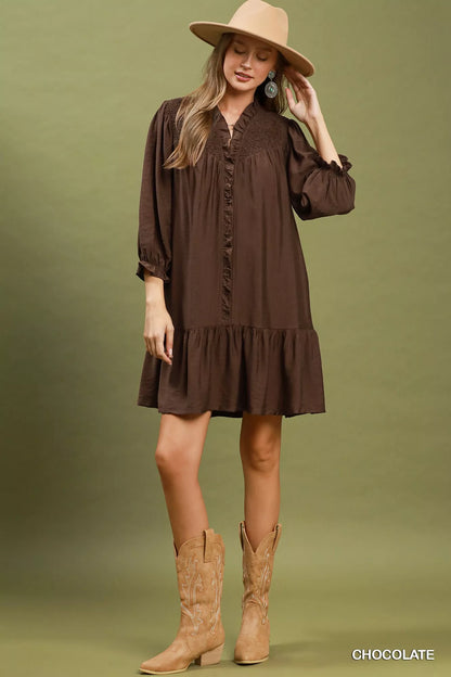 Chocolate Umgee smocked ruffle detail tiered mini dress, featuring a feminine design with ruffles and tiered layers.