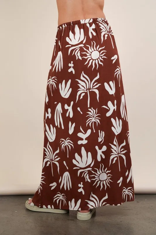 Chocolate-colored Very J printed resort midi skirt by Trendsi, featuring a flowy design and vibrant pattern.