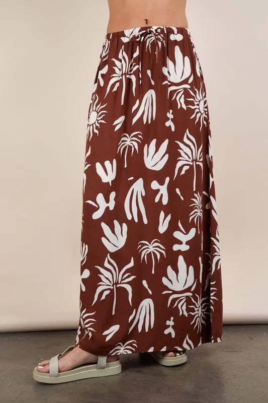Chocolate brown printed resort midi skirt by VERY J, featuring a flowy design and stylish pattern, perfect for summer outings.