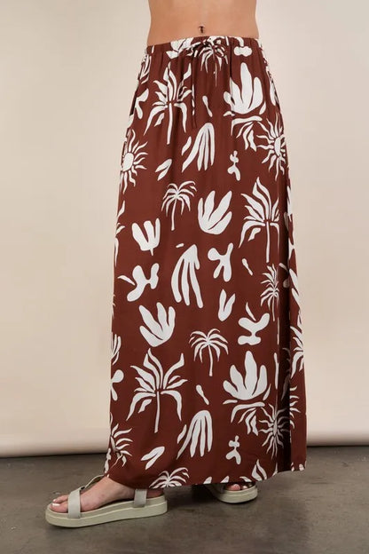 Chocolate brown printed resort midi skirt by VERY J, featuring a flowy design and stylish pattern, perfect for summer outings.