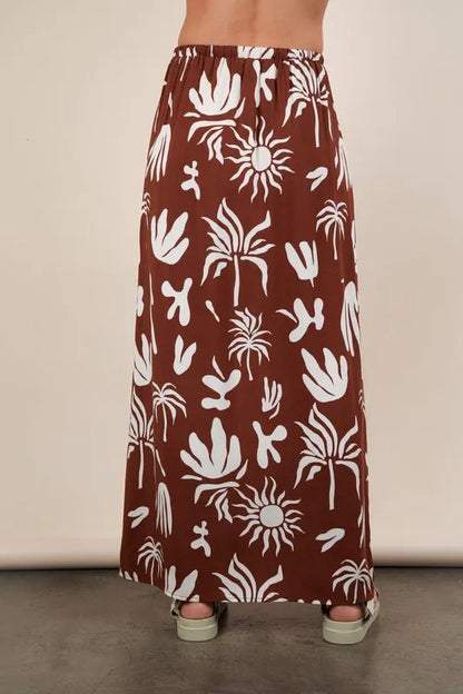 Chocolate brown printed resort midi skirt from Very J by Trendsi, featuring a flowy fabric and stylish design.