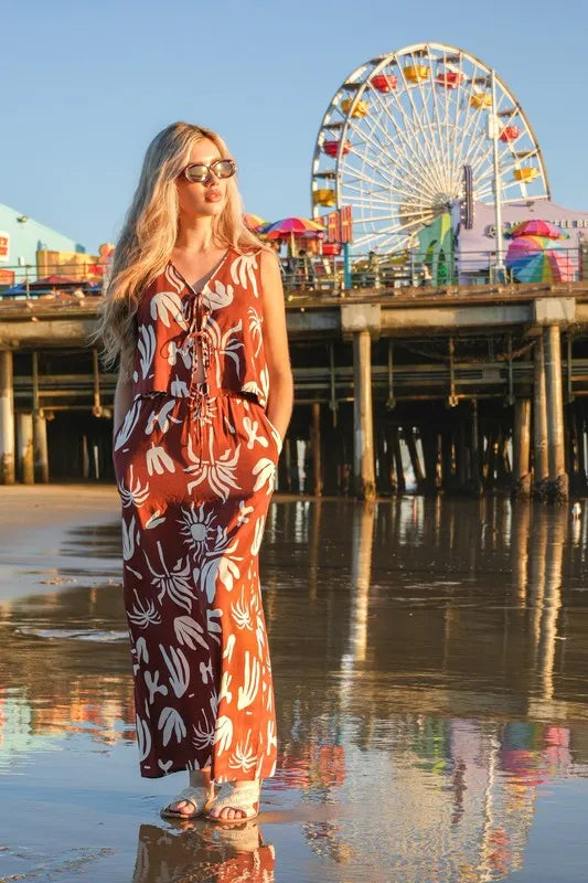 Chocolate brown printed resort midi skirt by Very J, featuring a flowing silhouette and vibrant floral pattern.