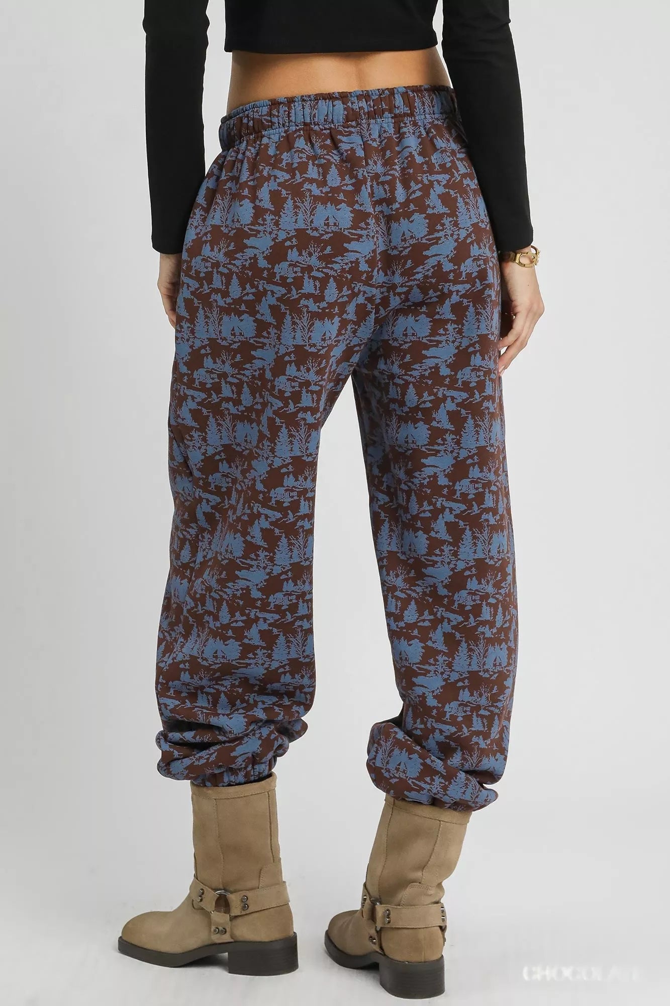 Chocolate-colored Umgee Scenic Print casual sweatpants with a relaxed fit and scenic print design, from Trendsi.