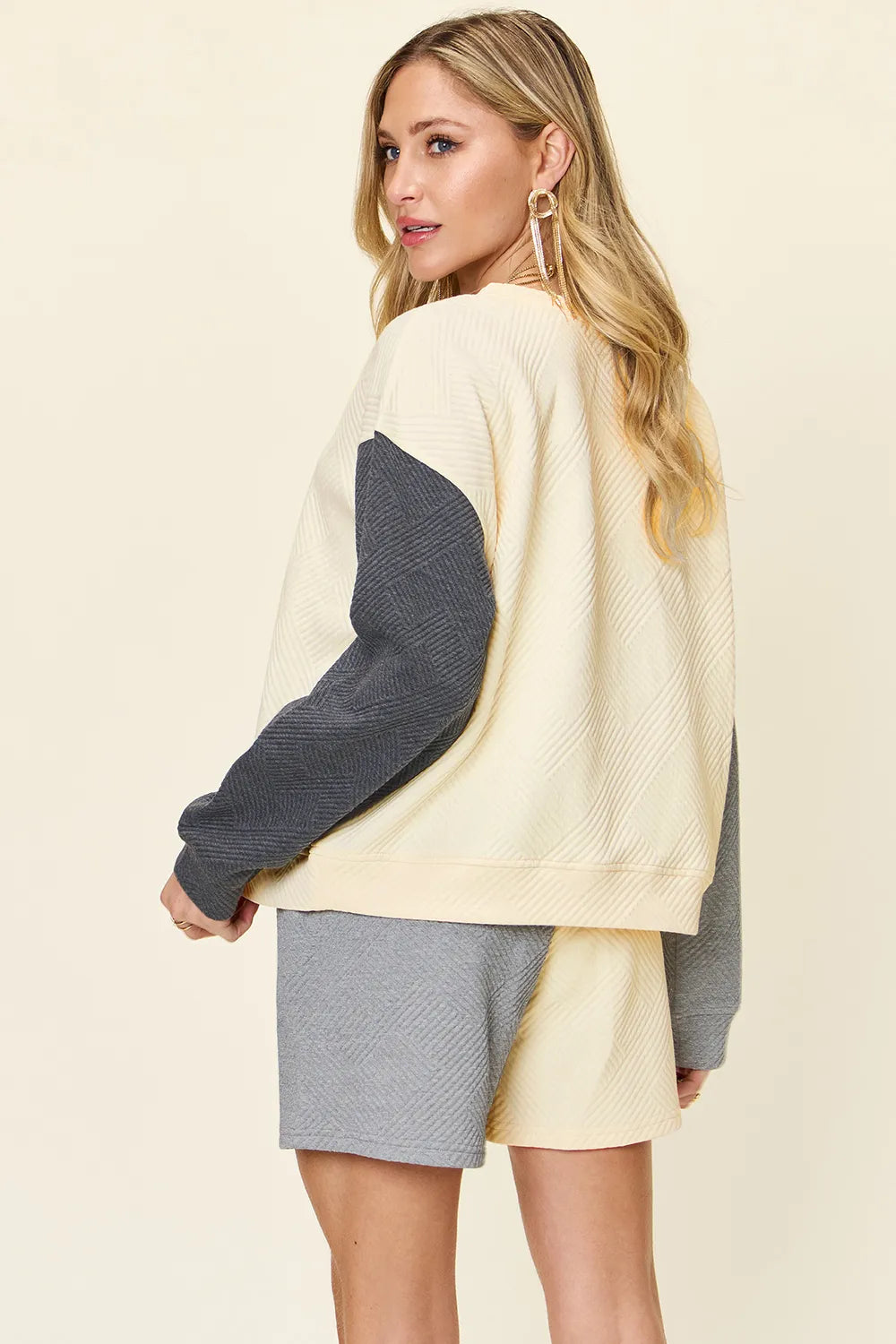 Cloudy blue double take top and shorts set by Trendsi featuring contrast drop shoulder design and relaxed fit.