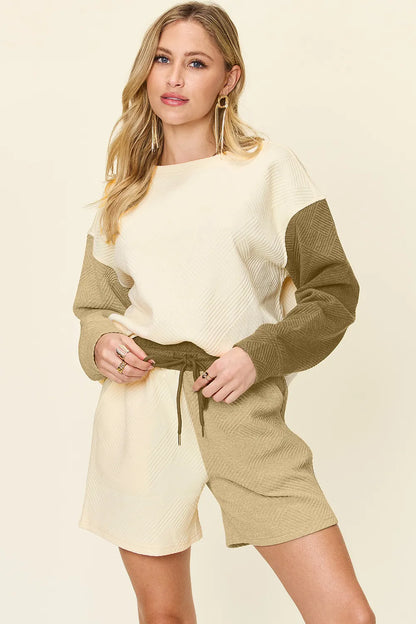 Cloudy blue double take full-size contrast drop shoulder top and shorts set by Trendsi, featuring relaxed fit and casual style.