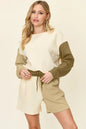 Cloudy blue double take full-size contrast drop shoulder top and shorts set by Trendsi, featuring relaxed fit and casual style.