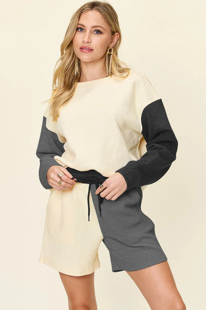 Cloudy blue double take full-size contrast drop shoulder top and shorts set by Trendsi, featuring relaxed fit and stylish design.