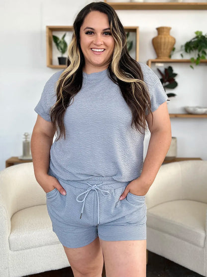 Trendsi double take full-size textured short sleeve T-shirt and drawstring shorts set in cloudy blue, casual and comfortable.