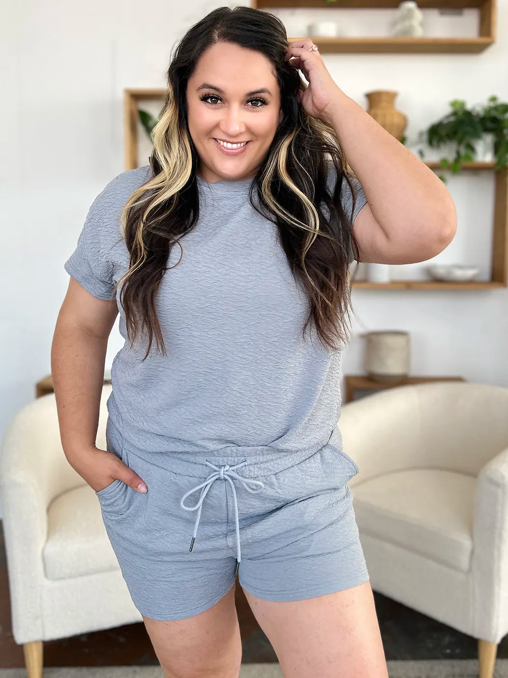 Cloudy blue Trendsi Double Take full-size textured short sleeve T-shirt and drawstring shorts set on a model.