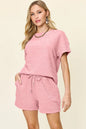 Cloudy blue Trendsi Double Take full-size textured short-sleeve T-shirt and drawstring shorts set, casual and comfortable activewear.