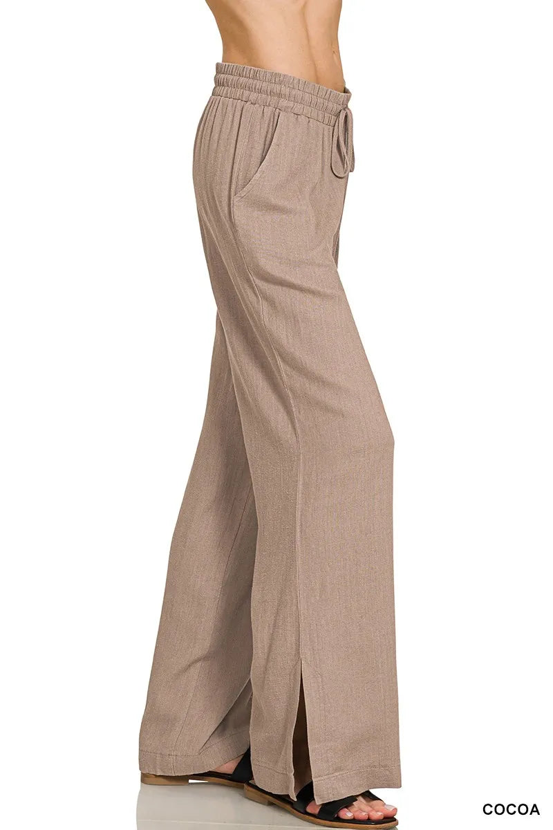 Cocoa Zenana Linen Drawstring Pants from Trendsi featuring relaxed fit and lightweight linen fabric with a casual, comfortable style.
