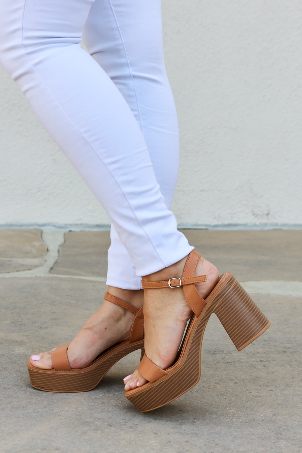 Cognac Weeboo Feel It platform heel sandals by Trendsi, featuring strappy design and chunky heel, on a white background.