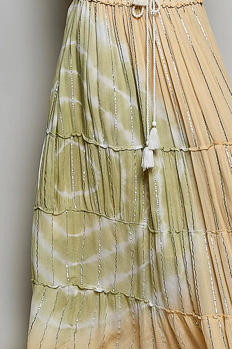 Coral Haze multi-colored shimmer tiered maxi skirt with reverse ruffles and smocked waist, designed by Trendsi.