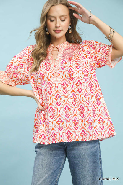 Coral mix boho puff sleeve smocked top by Umgee, featuring ruffled details and a relaxed fit, perfect for casual and bohemian styles.