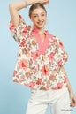 Coral mix floral puff sleeve blouse by Umgee, featuring lightweight fabric and feminine design, perfect for casual or dressy wear.