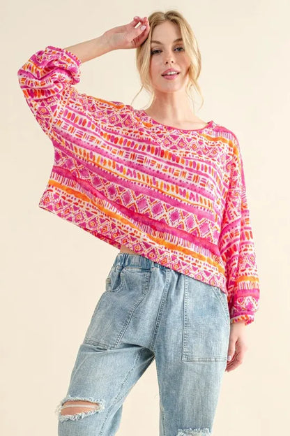Coral textured printed casual top from Trendsi with a cozy, relaxed fit and stylish design, perfect for everyday wear.