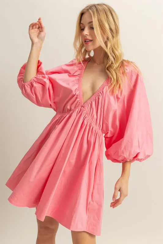Coral HYFVE plunge balloon sleeve poplin mini dress with pockets, featuring a stylish design and comfortable fit.
