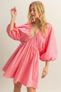 Coral HYFVE plunge balloon sleeve poplin mini dress with pockets, featuring a stylish design and comfortable fit.