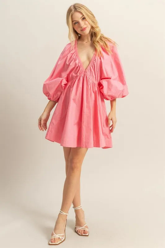 Coral HYFVE plunge balloon sleeve poplin mini dress with pockets, stylish and casual, featuring a fitted waist and puffed sleeves.