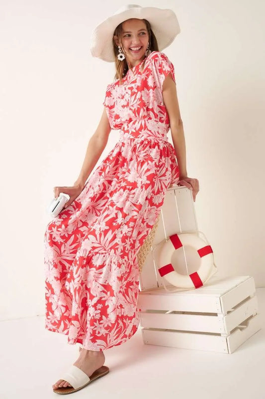 Tropical print top and skirt set by Mittoshop, featuring vibrant floral patterns and lightweight fabric for a stylish summer look.
