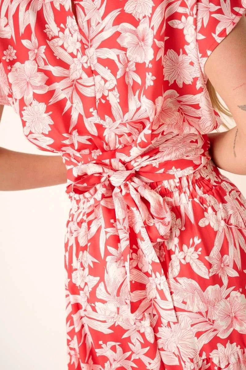 Tropical print top and skirt set by Mittoshop, featuring vibrant coral colors and lightweight fabric for a stylish summer look.