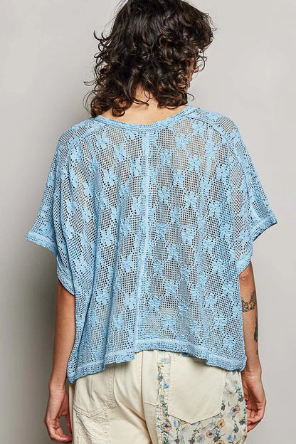 Cornflower blue crochet lace short sleeve top by Trendsi, featuring intricate lace detail and a relaxed fit.