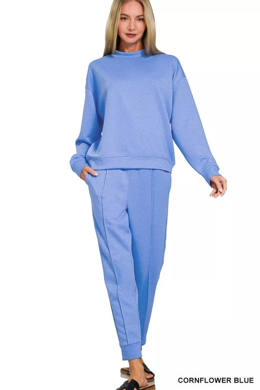Cornflower blue Zenana scuba sweatshirt and joggers set by Trendsi, featuring a mock neck design and comfortable fit.