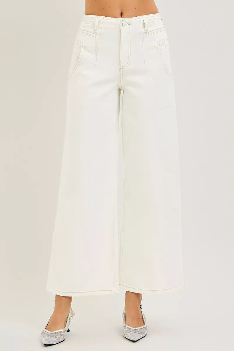 Cream RISEN high-rise ankle wide pants with a relaxed fit, shown on a model, featuring a stylish and comfortable design.