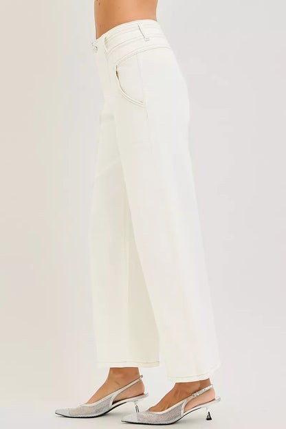 Cream RISEN high-rise ankle wide pants from Trendsi, featuring a relaxed fit and wide leg design, styled on a model.