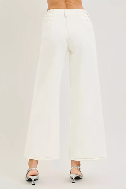 Cream RISEN high rise ankle wide pants from Trendsi displayed on a model, showing relaxed fit and stylish silhouette.