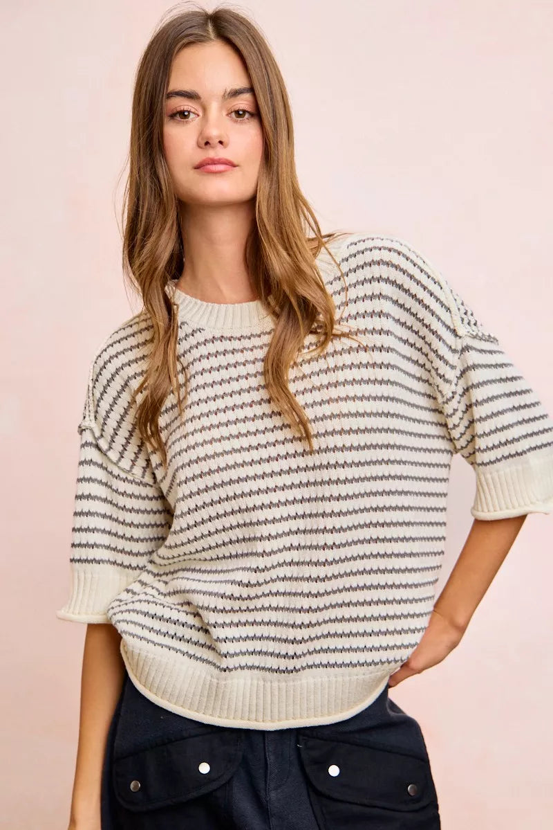 Cream and grey BiBi Stripes short sleeve ribbed knit top by Trendsi with banded outseam design, showcasing the fabric texture and fit.