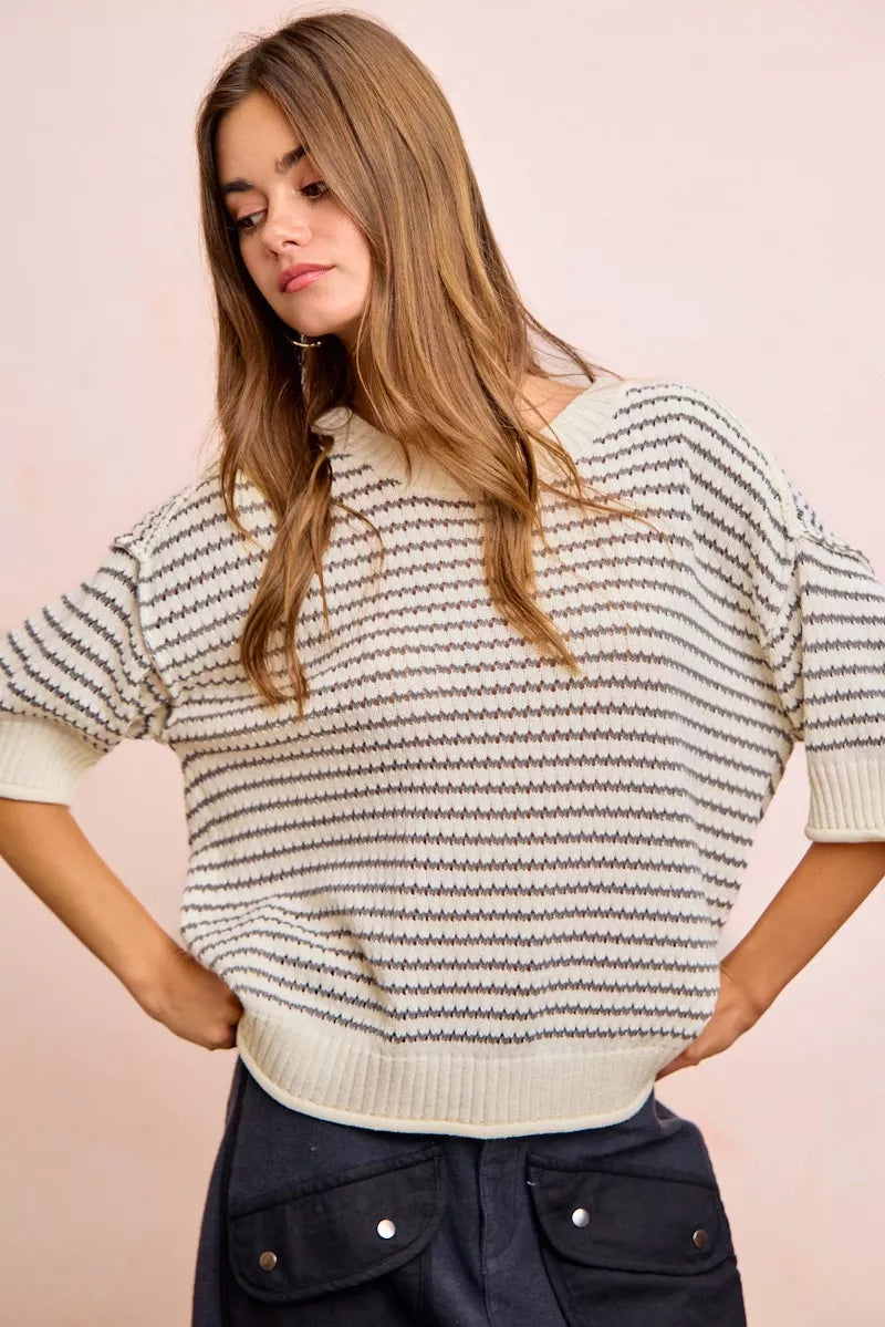 Cream and grey striped knit top by Trendsi with short sleeves, ribbed bands, and outseam design.