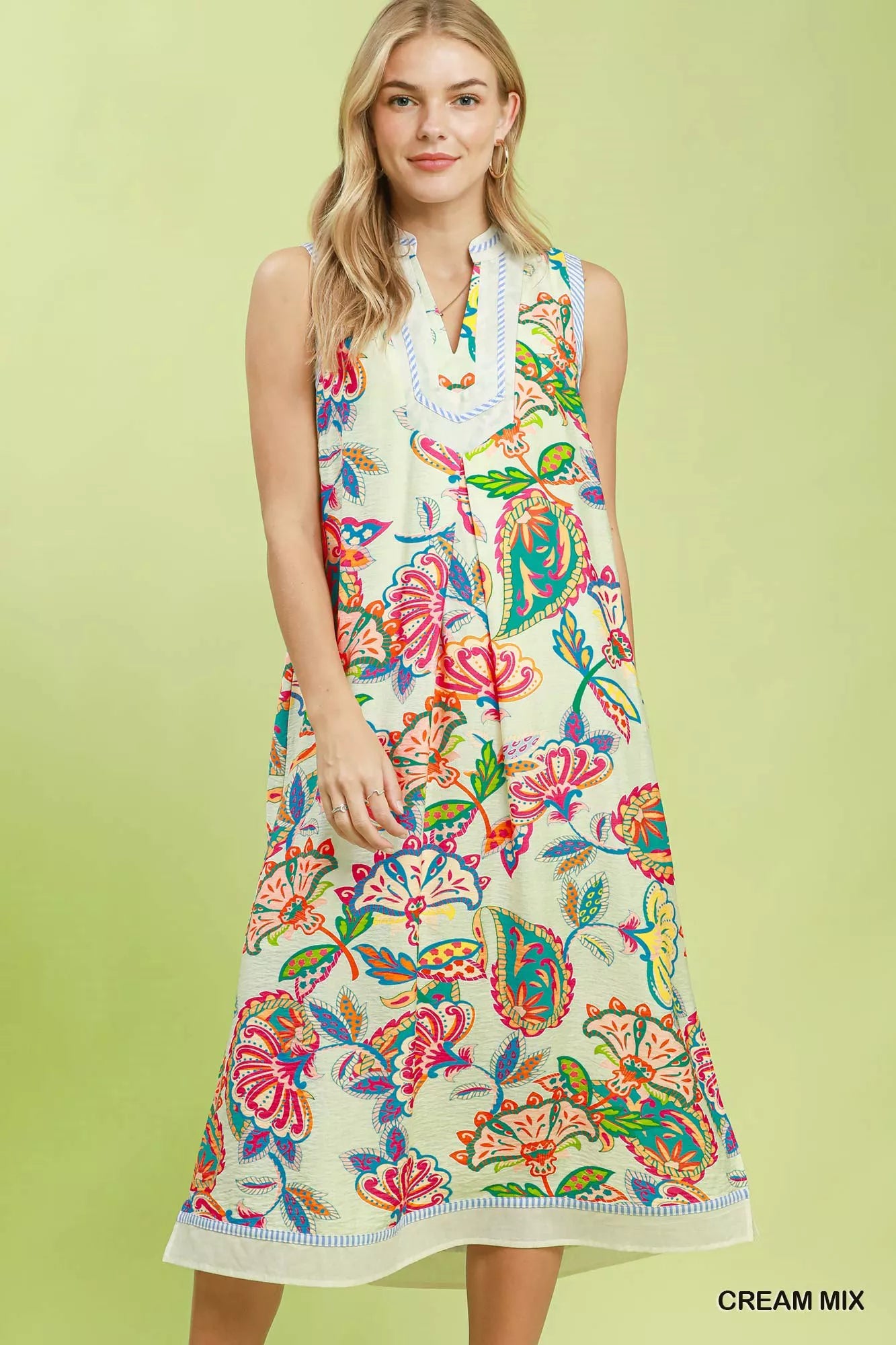 Cream Paisley floral sleeveless midi dress by Umgee, featuring a flowy silhouette and intricate floral patterns.