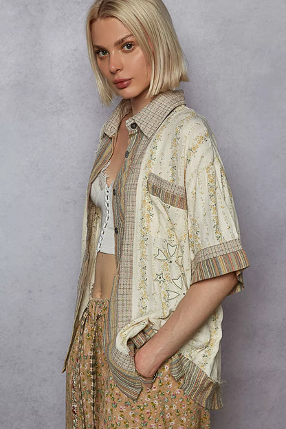 Trendi cream multi-colored patchwork short sleeve button-down shirt with printed design, casual men's fashion top.