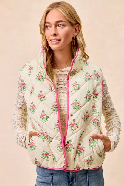 Cream and pink floral print quilted vest with piping detail from BiBi by Trendsi, shown on a model.