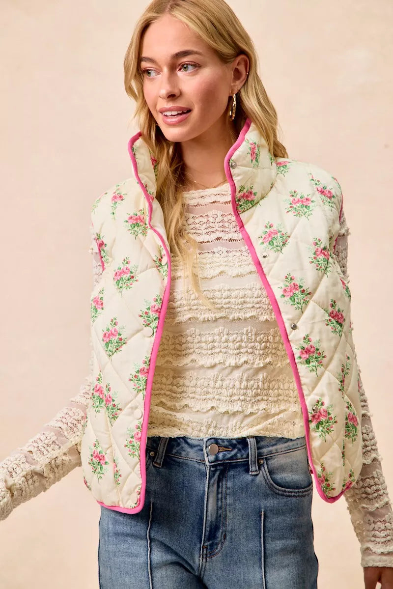 Cream pink BiBi floral print quilted vest with piping detail by Trendsi, featuring a stylish, padded design and floral pattern.