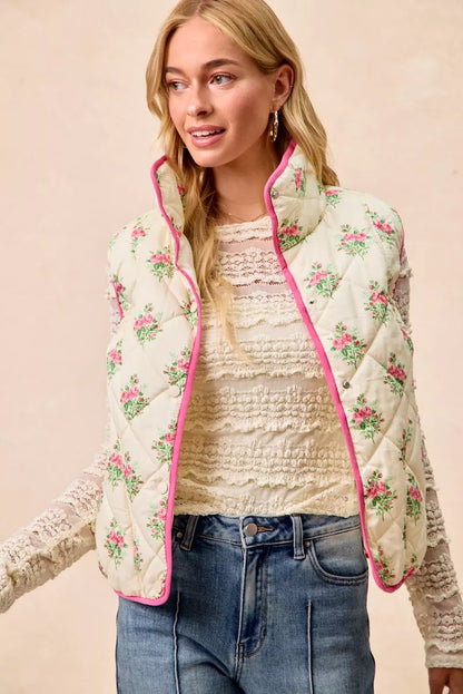 Cream pink BiBi floral print quilted vest with piping detail by Trendsi, featuring a stylish, padded design and floral pattern.