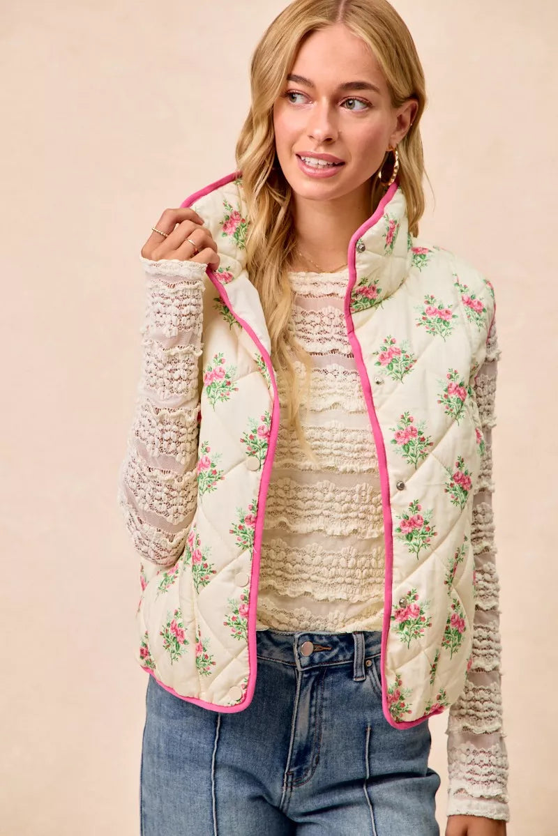 Cream pink Bibi floral print quilted vest with piping detail, featuring a stylish and cozy design from Trendsi.