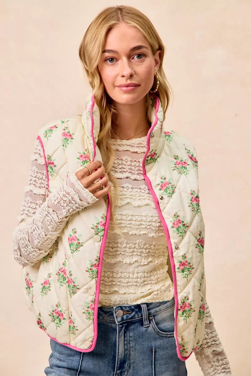 Cream pink floral print quilted vest with piping detail from Trendsi, featuring a stylish and cozy design.