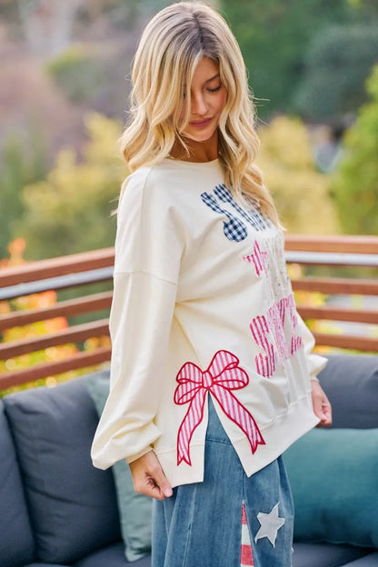 Cream sweatshirt with red, white, and blue stars and stripes patches for 4th of July celebration, by Trendsi.
