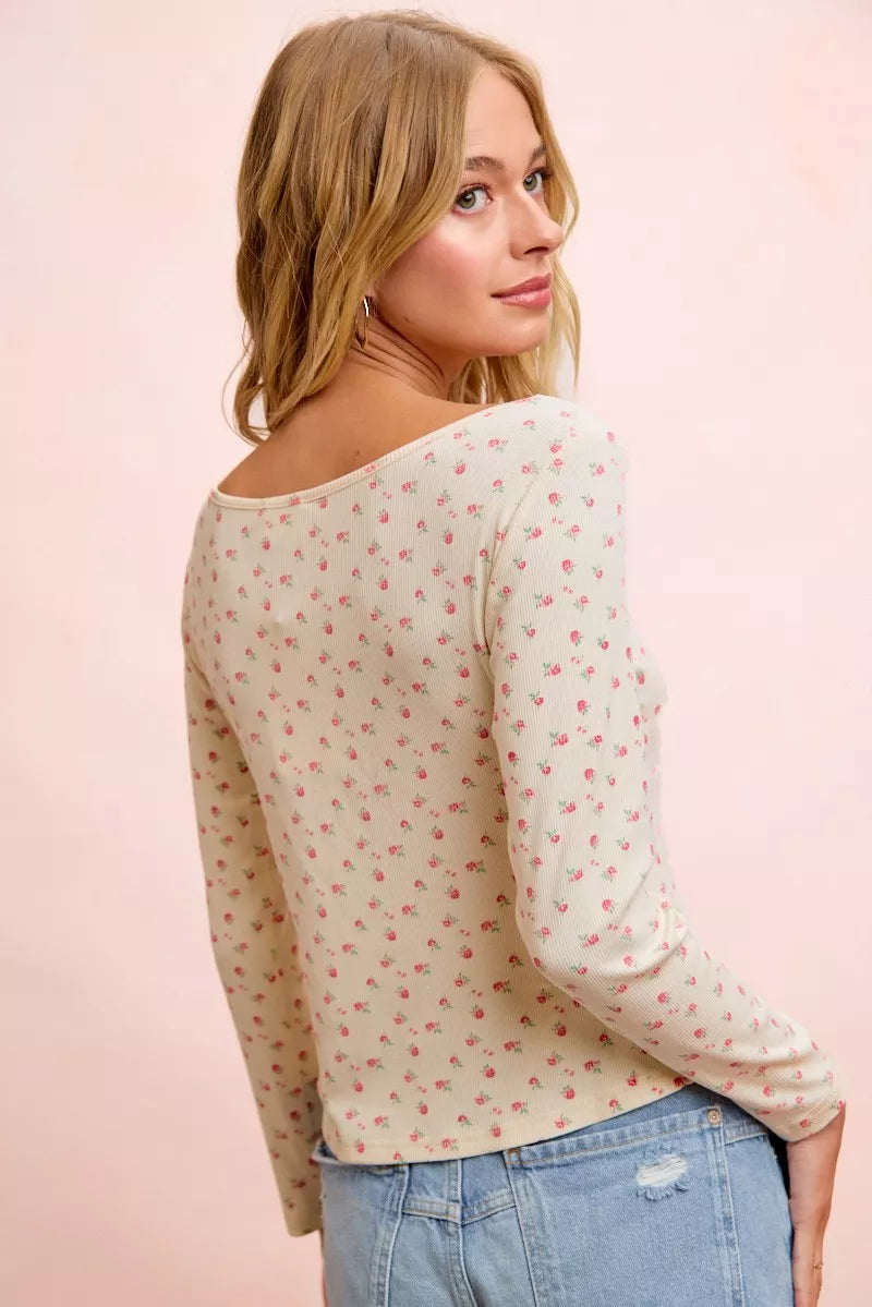 Cream floral printed long sleeve top made of spandex jersey from Trendsi, featuring a fitted, stylish design.