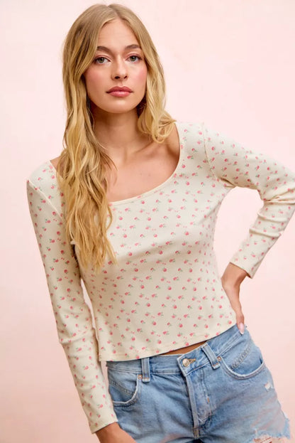 Cream floral printed long sleeve top by Trendsi, made from spandex jersey with a fitted, comfortable design.